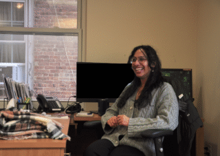 Anisha Sahni at desk